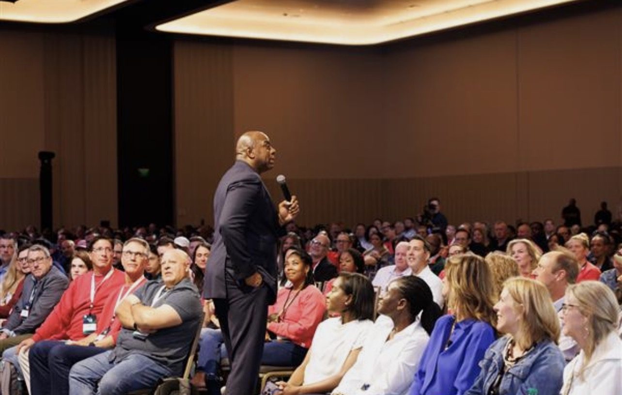 Magic Johnson delivering the closing keynote to a packed general session